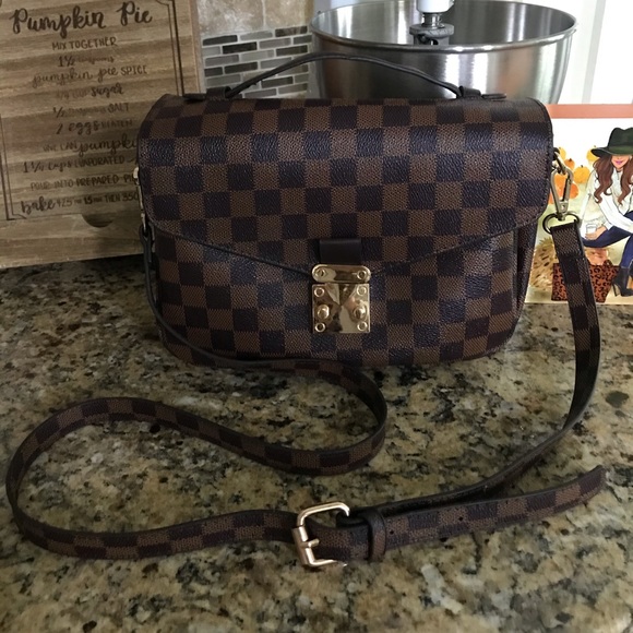 tory burch bird bolsa